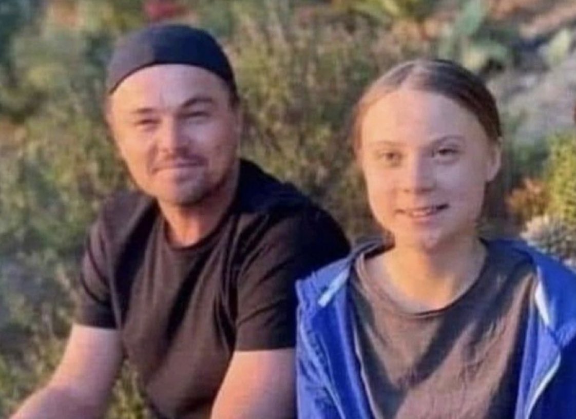 Lovely photo of one of the greatest actors of all times sitting with Leonardo DiCaprio. #ClimateScam