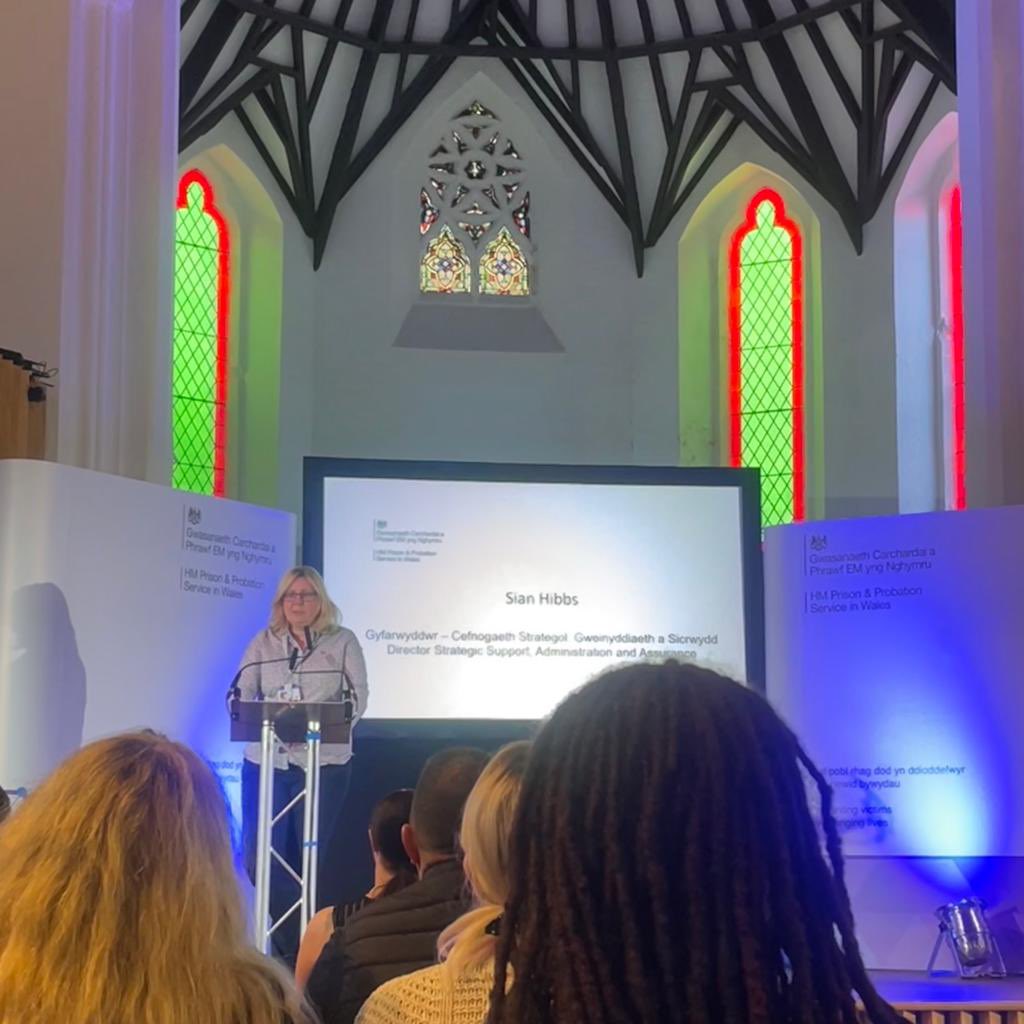 Our SRO, Sian Hibbs, takes to the stage to introduce Grand Avenues to partners at our <a href="/HMPPSCymru/">HMPPS in Wales / HMPPS yng Nghymru</a> showcase event. <a href="/s1hibbs/">Sian</a>