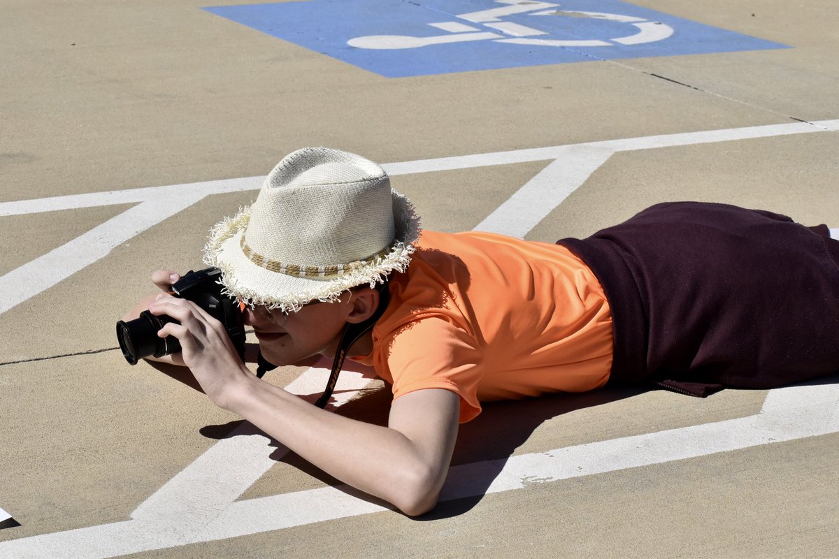 PrincetonISD's tweet photo. Lovelady yearbook adviser Nancy Longino took her yearbook staff outside to practice depth perception shots. Students Cayden Stover, Ernesto Fernandez and Chino Torres also got the added bonus of enjoying this weather. #IsItReallySpring https://t.co/TuqcAmGzBu
