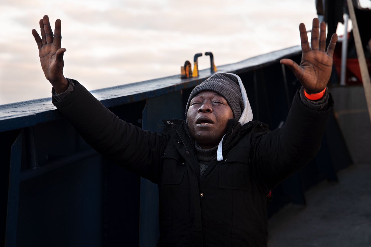XimenaBorrazas's tweet photo. Cloely, a 27-year-old Ivorian rescued from a wooden boat on 15 February thanking Allah for her survival and praying for her future and that of the humanitarian vessel Aita Mari. 

#SearchAndRescue #SARMalta #Migrants #Africanmigrants #MediterraneanSea #Pateras #Rescue https://t.co/aKg7oNwOTG