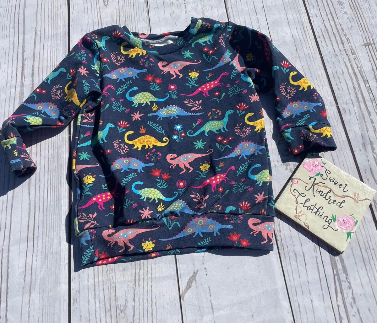 Excited to share this item from my #etsy shop: Colourful Dinosaur jumper, gender neutral Dinosaur jumper etsy.me/3ZaJwYa
#craftbizparty #ukmakers #htlmp