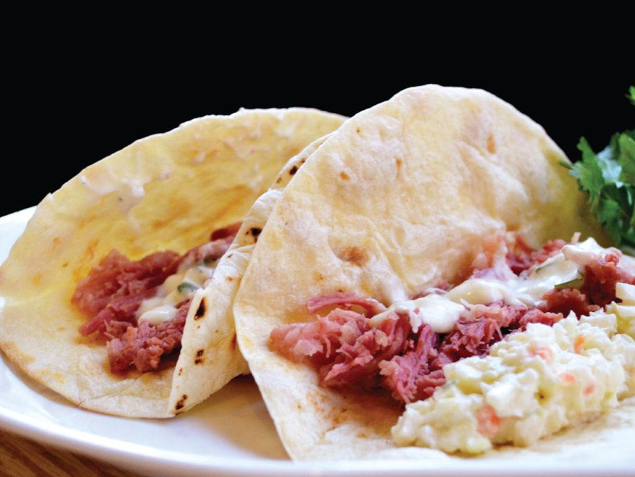 How do you celebrate #tacotuesday right before March? ☘️ Try our Irish Tacos recipe - steaming pulled corned beef drizzled with yogurt, mayo, lime juice, cilantro, and cayenne pepper sauce! Add coleslaw for a bit of crunch! 🌮🌯 
Grab it here: ow.ly/xV7150N5gui