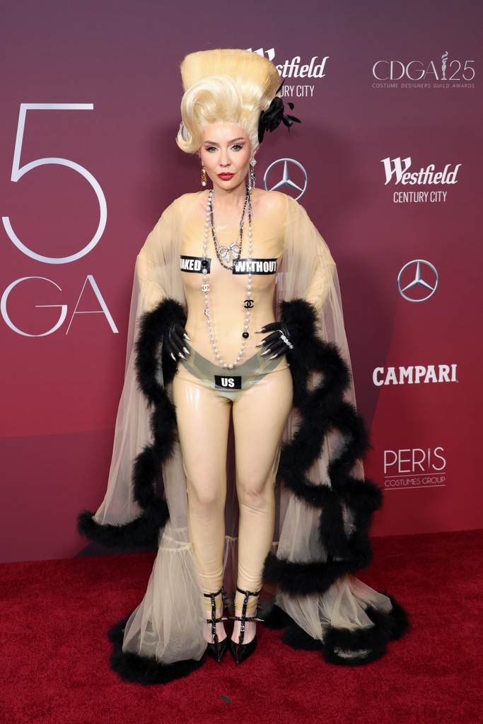 FashionWeek's tweet photo. The #CostumeDesignersGuildAwards were held in LA honoring their brilliant hard work in the TV and film industry. On the red carpet, designers #BeaAkerlund, #DawnRitz, #MandiLine, & #JennyBeavan wore outfits that called for pay equity that read out the slogans 'Naked Without Us'. https://t.co/ANwPFBvttb
