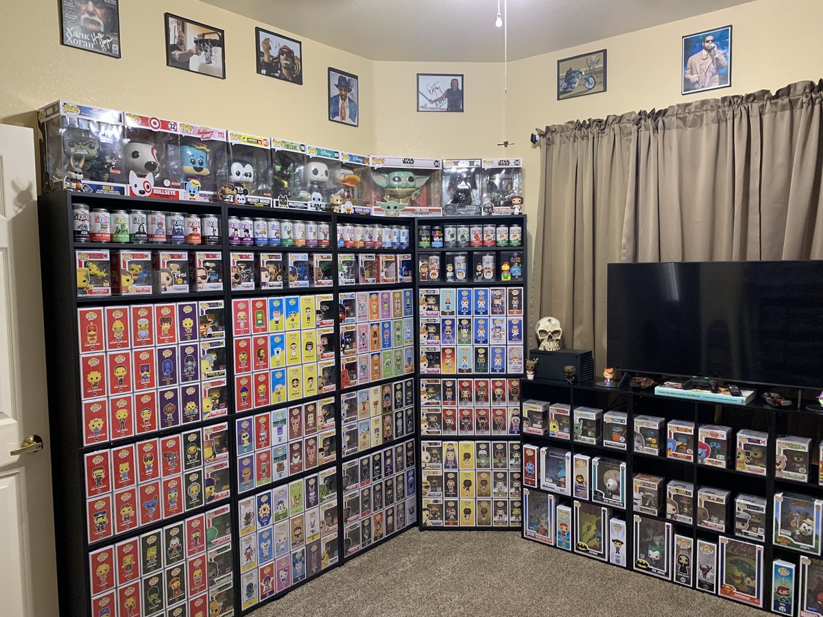 Mr_Bob_Belcher's tweet photo. Heres the new #Funko room #FunkoFamily took 3 days to purge,move rooms &amp; setup again. Added the autographs on the wall for accent to the pops. Lost 4 bookcases &amp; many shelves. But it looks great &amp; minimalistic! #FunkoSoda #FunkoFunatic #FOTW @OriginalFunko https://t.co/bqfOJpo4Pe