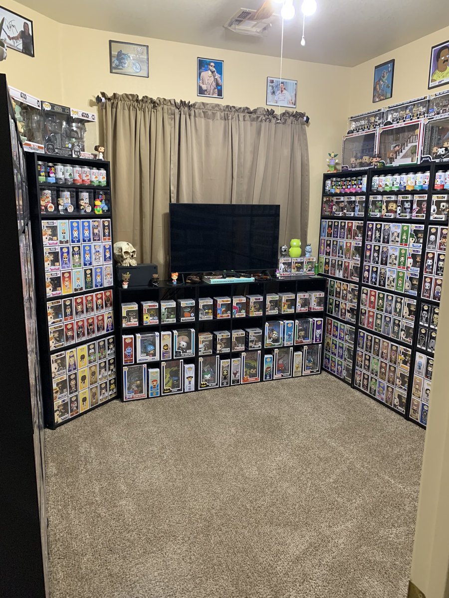 Mr_Bob_Belcher's tweet photo. Heres the new #Funko room #FunkoFamily took 3 days to purge,move rooms &amp; setup again. Added the autographs on the wall for accent to the pops. Lost 4 bookcases &amp; many shelves. But it looks great &amp; minimalistic! #FunkoSoda #FunkoFunatic #FOTW @OriginalFunko https://t.co/bqfOJpo4Pe