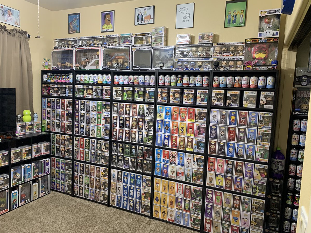 Mr_Bob_Belcher's tweet photo. Heres the new #Funko room #FunkoFamily took 3 days to purge,move rooms &amp; setup again. Added the autographs on the wall for accent to the pops. Lost 4 bookcases &amp; many shelves. But it looks great &amp; minimalistic! #FunkoSoda #FunkoFunatic #FOTW @OriginalFunko https://t.co/bqfOJpo4Pe