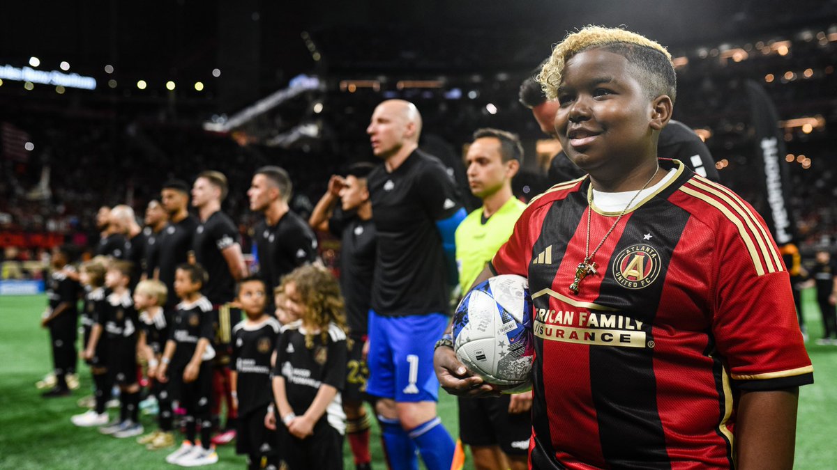 ATLUTD's tweet photo. We loved having Wish Kid Nathan as our honorary captain at Saturday's home opener ❤️🖤 https://t.co/OlNIdqGVbh