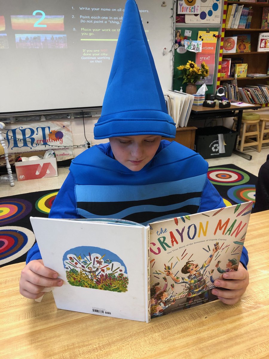 ErinMancini3's tweet photo. One of my students really went #BonkersForBooks today in Read-A-Thon silly spirit! He even found the perfect book in Mrs. Farrell’s art room to read… 🖍📚🎨 https://t.co/o3wlgeaIbH