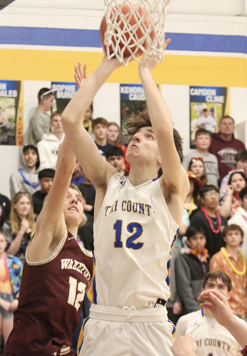 SCIStephanie's tweet image. BBB: Cameron Reynolds of @TrojansTC puts up two points against Wakefield in the district final game Feb. 28. #tricountytrojans #putback #beinposition