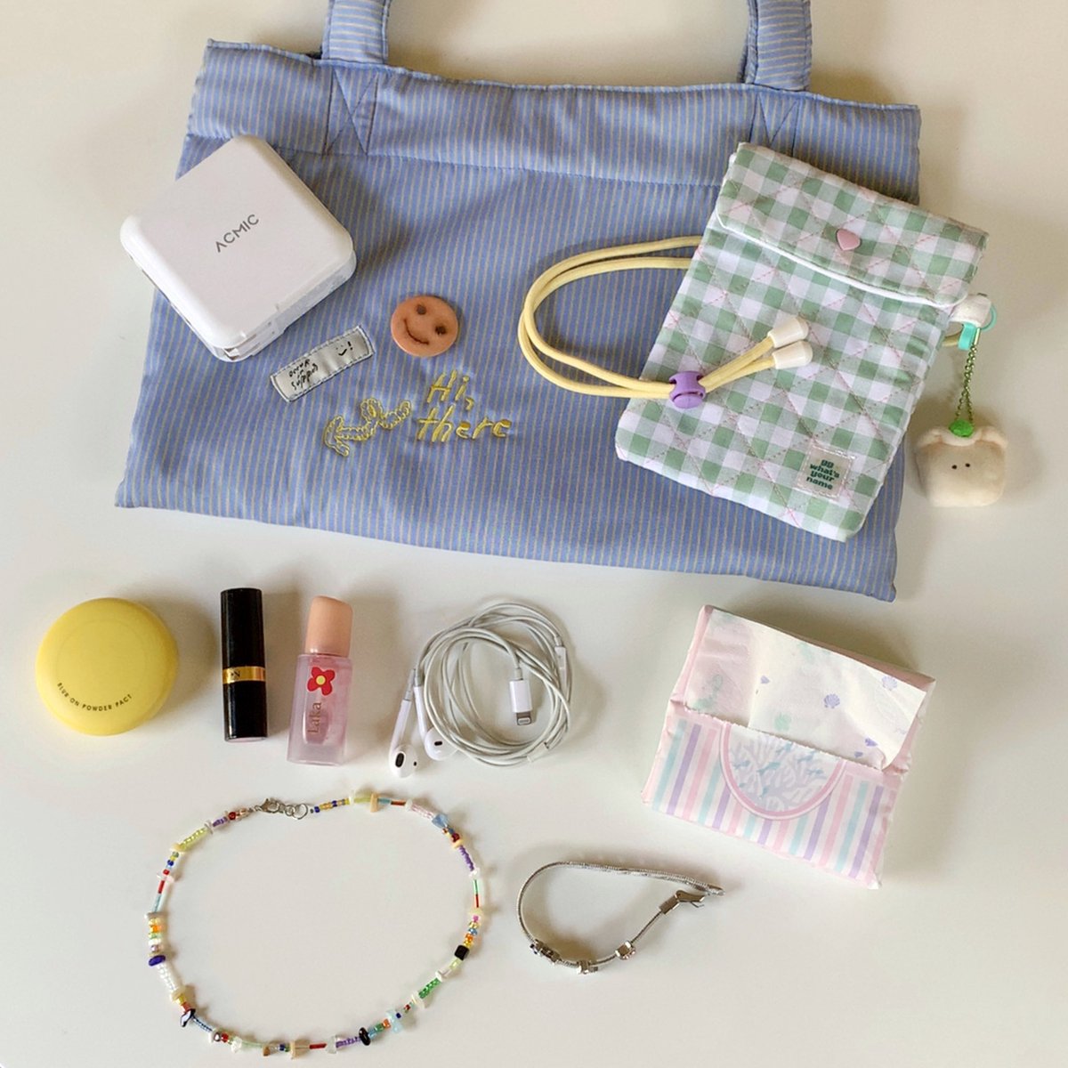 melonleecake's tweet photo. what’s in my bag  🎀🌈⛅️ https://t.co/Wq0pW31i8B