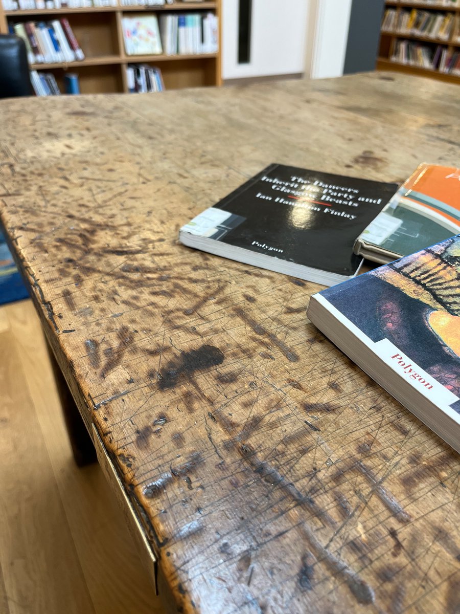houchin_liz's tweet image. In the Scottish Poetry Library I’m at the desk of poet WS Graham, which he called his ‘untidy dreadful table’. 

I can’t imagine the table liked him much either… it’s covered in marks from stubbing out cigarettes. 

@poetryireland @artscouncil_ie @ByLeavesWeLive #FarAfield