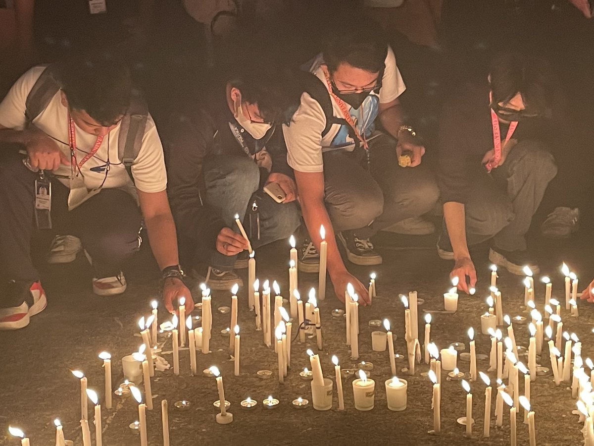 ABSCBNNews's tweet photo. LOOK: Students at the Adamson University campus in Manila light candles amid calls for justice for the death of fellow “klasmeyt” John Matthew Salilig who allegedly died from hazing. | via @anjo_bagaoisan https://t.co/4XZlGbmjaF