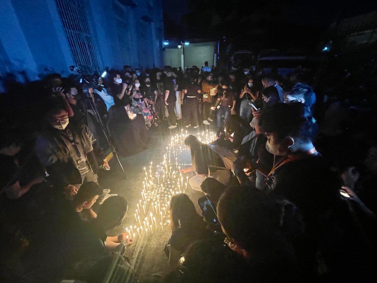 ABSCBNNews's tweet photo. LOOK: Students at the Adamson University campus in Manila light candles amid calls for justice for the death of fellow “klasmeyt” John Matthew Salilig who allegedly died from hazing. | via @anjo_bagaoisan https://t.co/4XZlGbmjaF