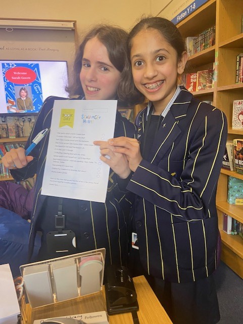 STAHSLibrary's tweet photo. A great deal happening in the Library this week and we have had so much fun. A scavenger hunt with teams running round finding clues, Y9 classes choosing a new book they will love in a speed dating session and a big book giveaway! #WorldBookDay https://t.co/aPQeFKoBze