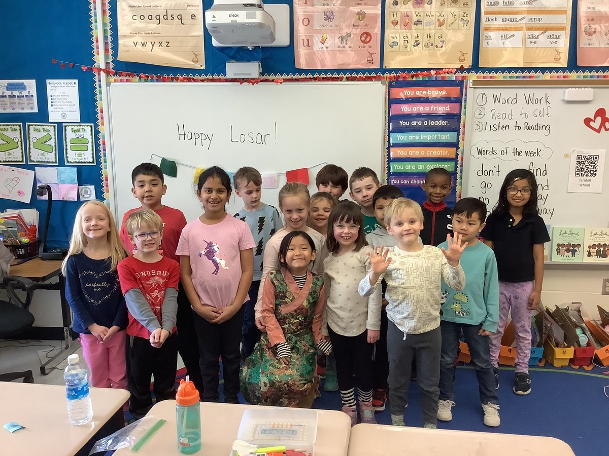 I am so proud of my sweet student.  She taught our entire class about the Tibetan New Year.  She did a great job and we learned so much!  Happy Losar!