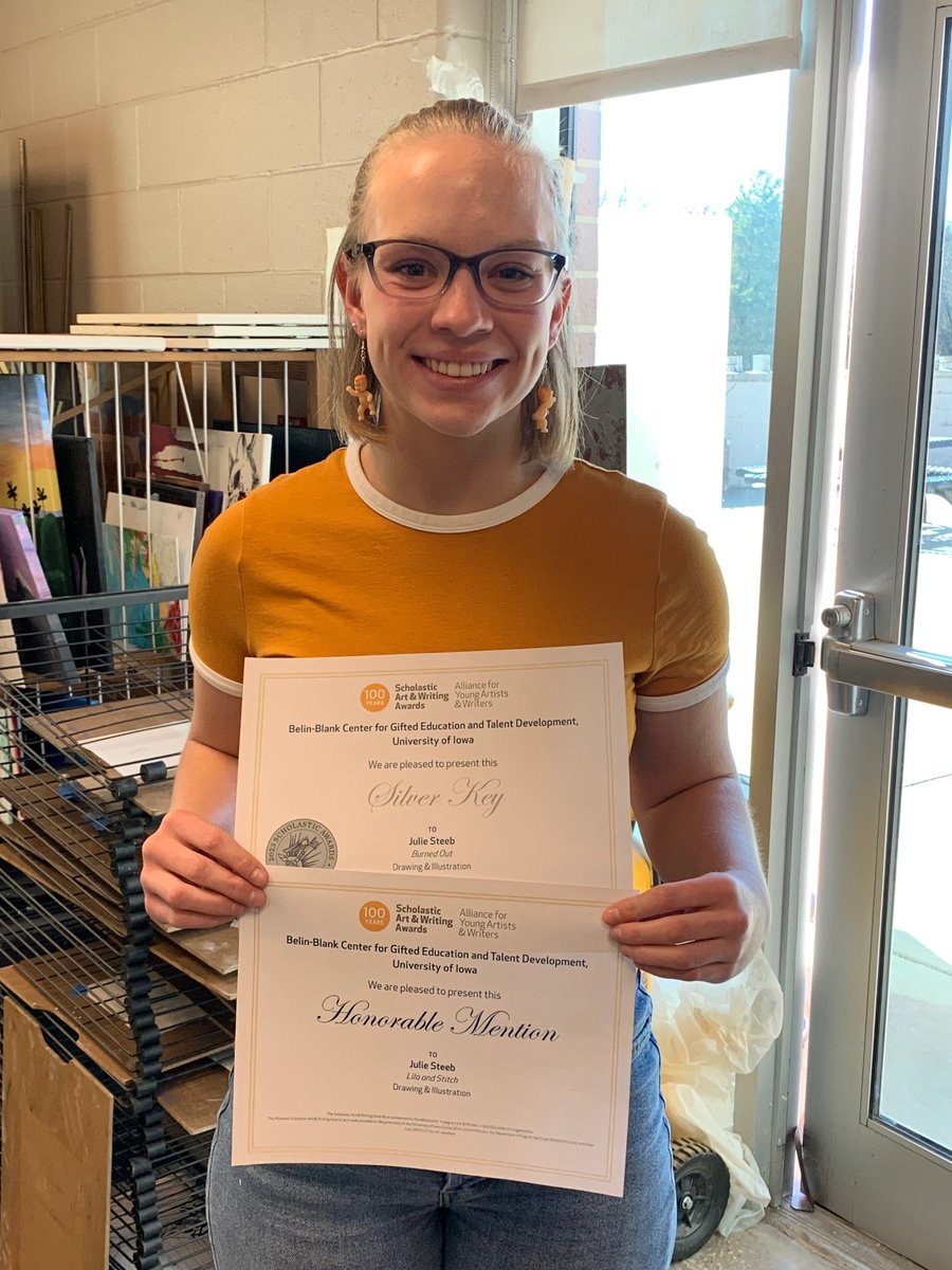 DhsArts's tweet photo. DHS Student Artist, Julie Steeb was awarded a Silver Key in Drawing and Illustration for her art work, "Burned Out" and an Honorable Mention Award in Drawing and Illustration for "Lilo and Stitch" in the Midwest Regional Scholastic Art and Writing Award Competition. Congrats! https://t.co/U2yaG1fbSS