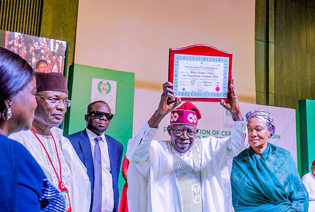 Obiorapaul10's tweet photo. Earlier, President-Elect, Asiwaju Bola Tinubu, collects his Certificate of Return from the Independent National Electoral Commission (INEC). 

The certificate was presented to Tinubu by the Chairman of INEC, Prof. Mahmood Yakubu who is also Returning Officer of the election. https://t.co/M5z06QToVK