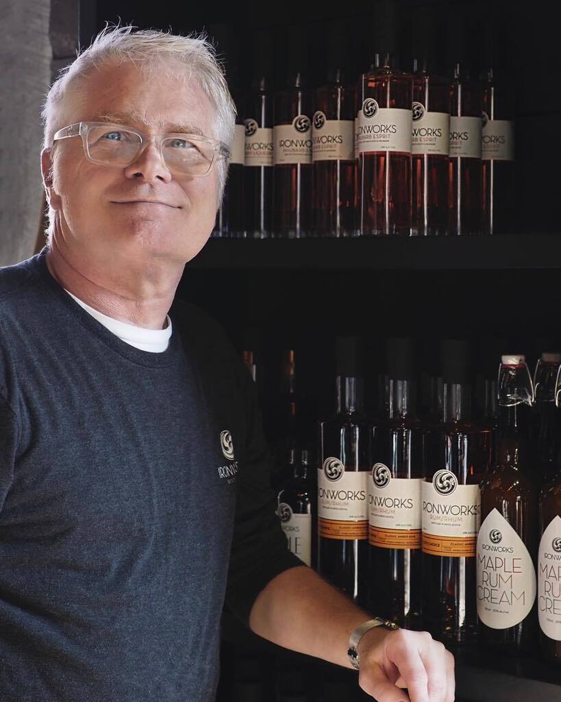 Meet Greg!

Greg is a Shop Supervisor, and is going into his second year with us here at Ironworks. Previously he was a travel agent for 25 years! He was also a hairstylist for 14 years before settling here in Lunenburg.

His favourite product is our Gin… instagr.am/p/CpQdujgPdb8/