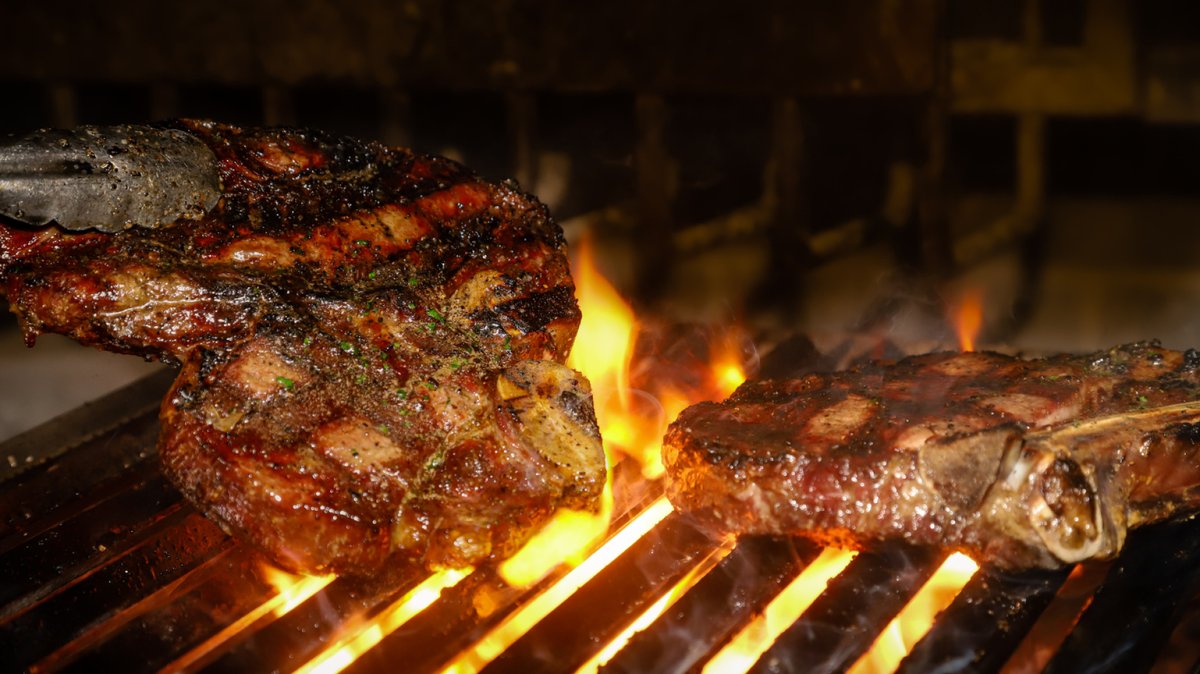What's your preferred cut?  T-Bone or Bone-in Ribeye?

The flames have been stoked. 
Serving steak &amp; chops from the hearth until 9pm.

#steak #steakhouse #chophouse #thegrovestl #beastbutcherandblock #stlouis #livefirecooking #ribeye #blackgarlic #blackangus #tbonelove