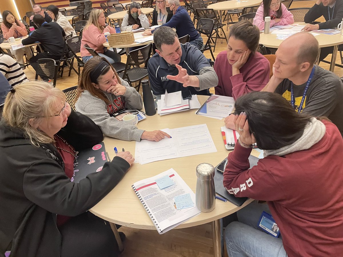 DCollinsISB's tweet photo. ES teachers are discussing shifts in practice for #comprehension. Rich discussions around #textdependent questions, students carrying the #cognitive load and #purposeful planning took place this morning. @ISBeijing #learnisb #scienceofreading @MJLiben https://t.co/V5eSN2LaAa
