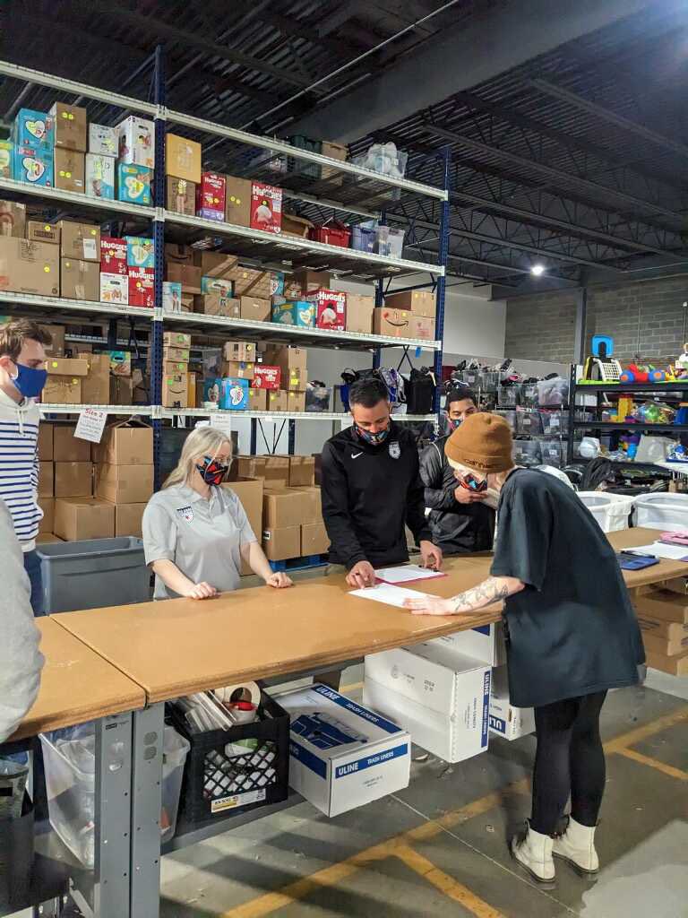Members of the CRS Front Office volunteered today at our community partner, @ShareOurSpare! We helped sort donated inventory for local families in need.