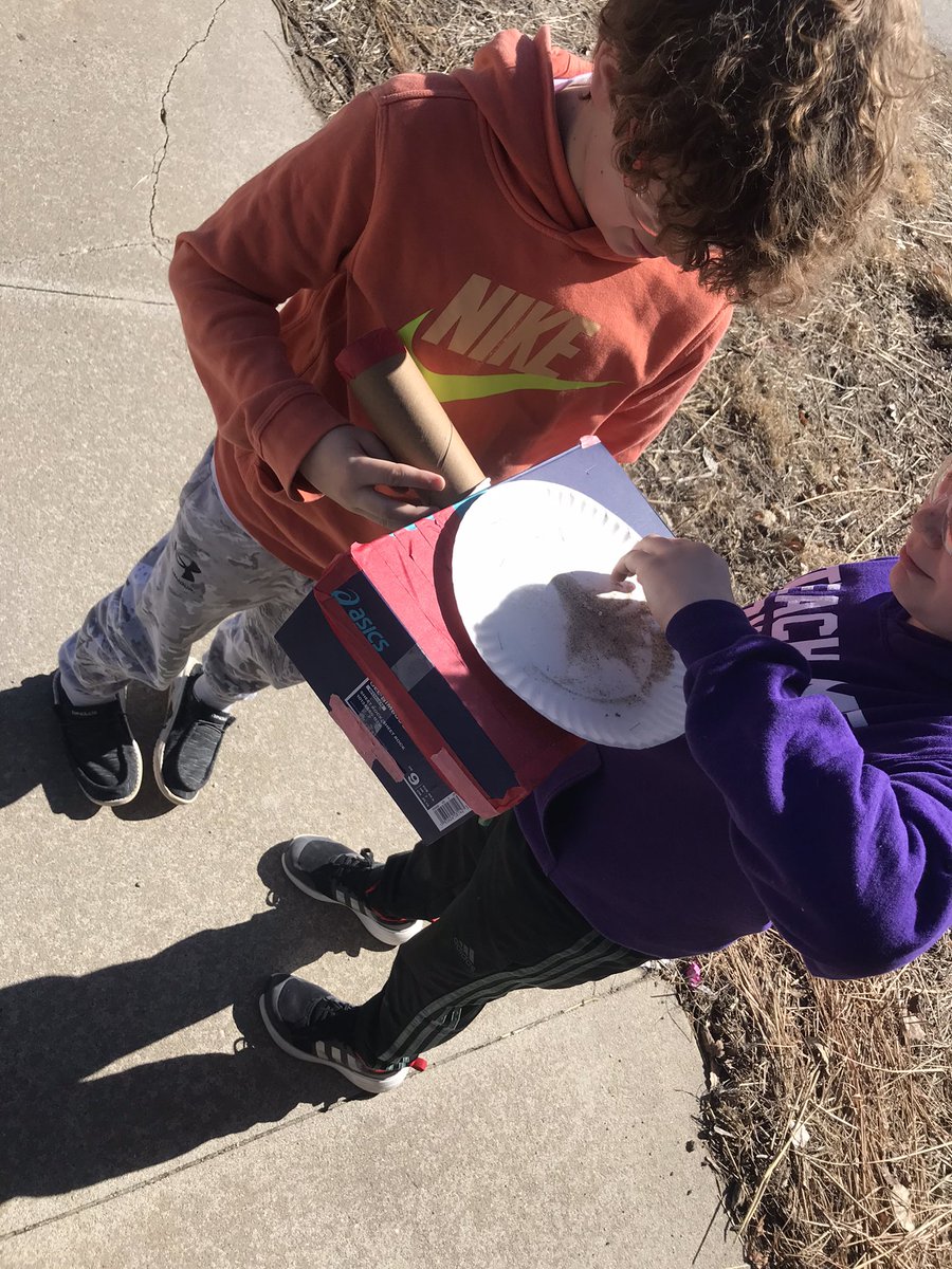 Students designing “Sound Watchers” investigating how they can see sound waves. We may have brought a few people to our door to check out what all the noise was!