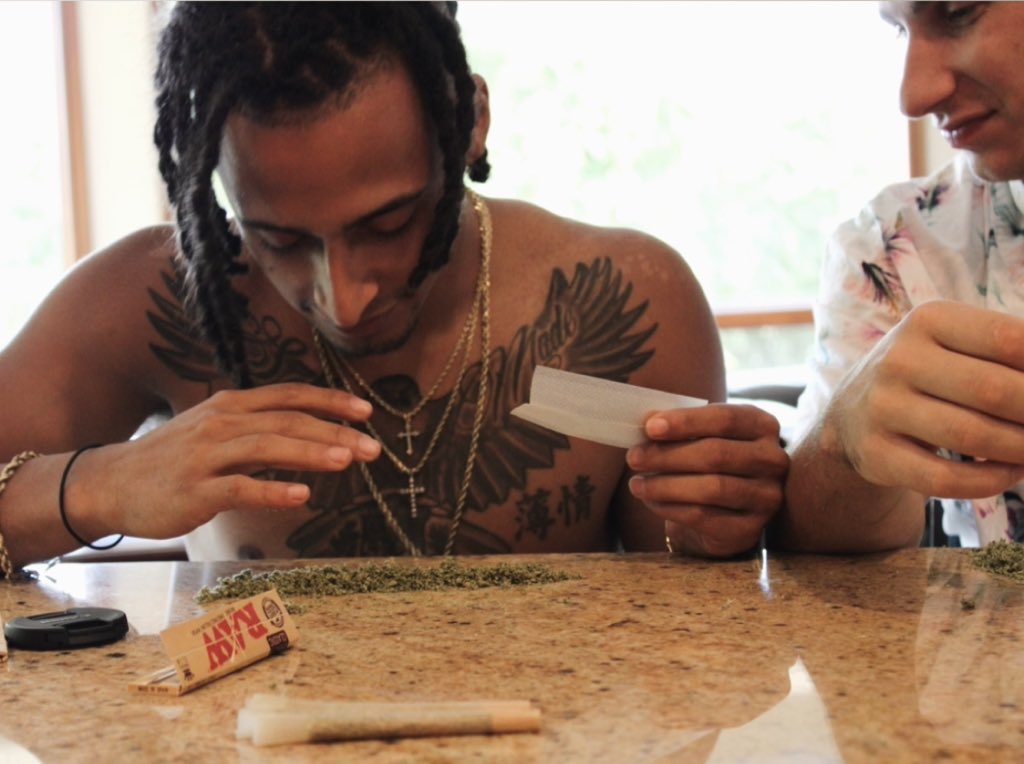All you niggas chasing bitches I’m just rolling up