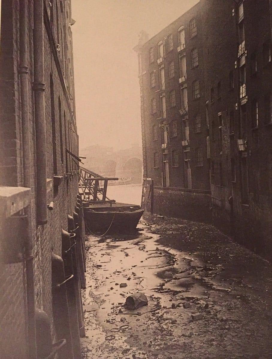 Puddle Dock, Blackfriars, City of London circa 1920. 
In medieval times it was a place where horses were watered. Today it is a busy highway, having been infilled, with the buildings on the left being where the Mermaid Theatre now stands.