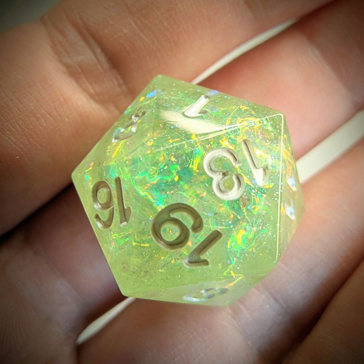 Sprite
We will have this D20 single and a full set of this design available on Saturday! 

#handmadedice #faefolk #fairycore #tabletopgaming #polyhedraldice