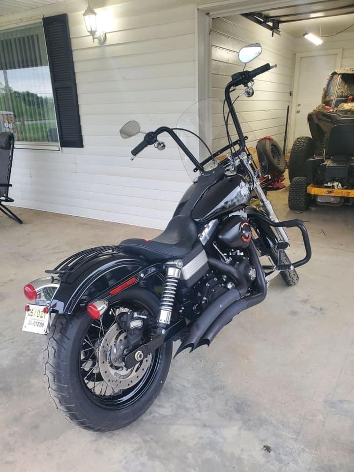 2010 Dyna street bob
9k
27,XXX Miles 
6 speed transmission.
96 twin cam 
Comes with a passenger seat and pegs.
I had had absolutely no problems with this bike. 

Side note, it is located in Oklahoma currently