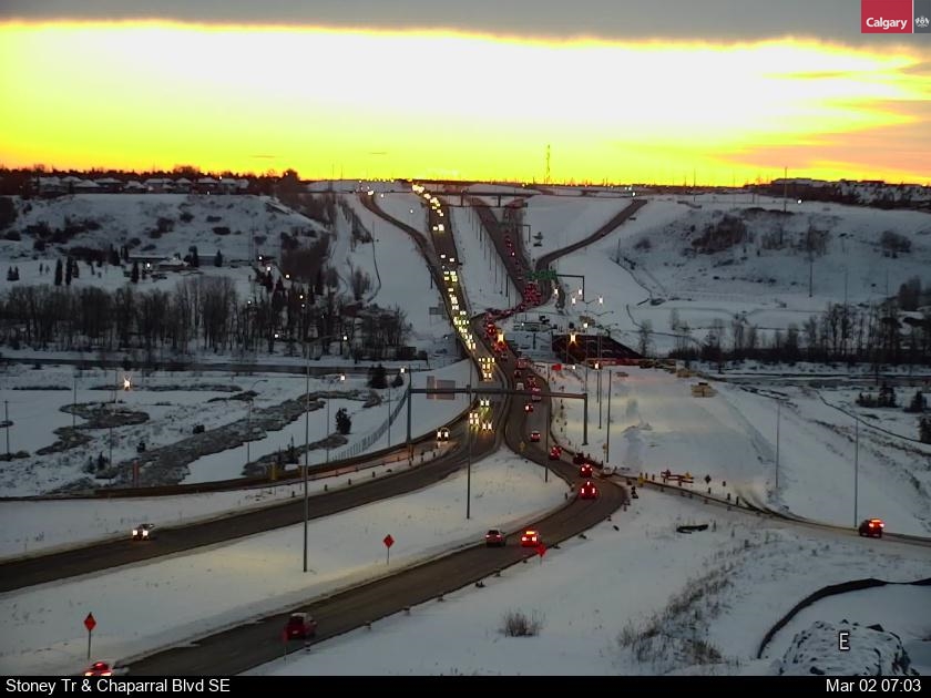 NewsRadioCGY's tweet photo. A yellow fire sky for Thursday morning!

Road conditions vary, significantly, around #yyc. Some routes drying well, others dealing with (very) icy stretches, blowing and drifting snow. #SafeTravels #yyc #yyctraffic #yycroads #abroads 

(PIC: Stoney Tr at Chaparral Blvd SE.) https://t.co/TcEk3Z7Xsa