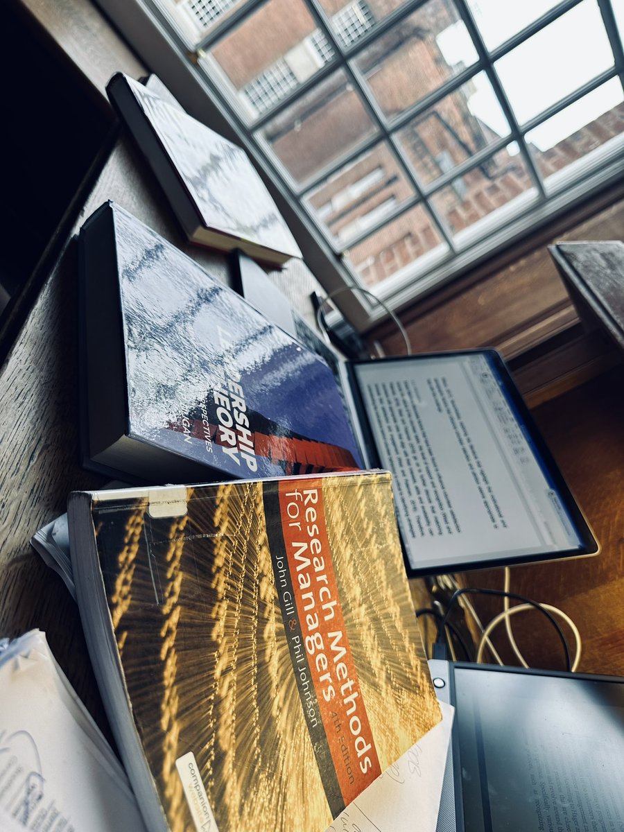 DT_L's tweet image. I’m sure #WorldBookDay2023 was supposed to be more fun than this, but who says adults can’t join in the picture fun!!!! The view out the window isn’t bad though! @alumniUoM @UoMLibrary #MBA #MBAdissertation #FinalYear #WorldBookDay #Manchester  @MENnewsdesk