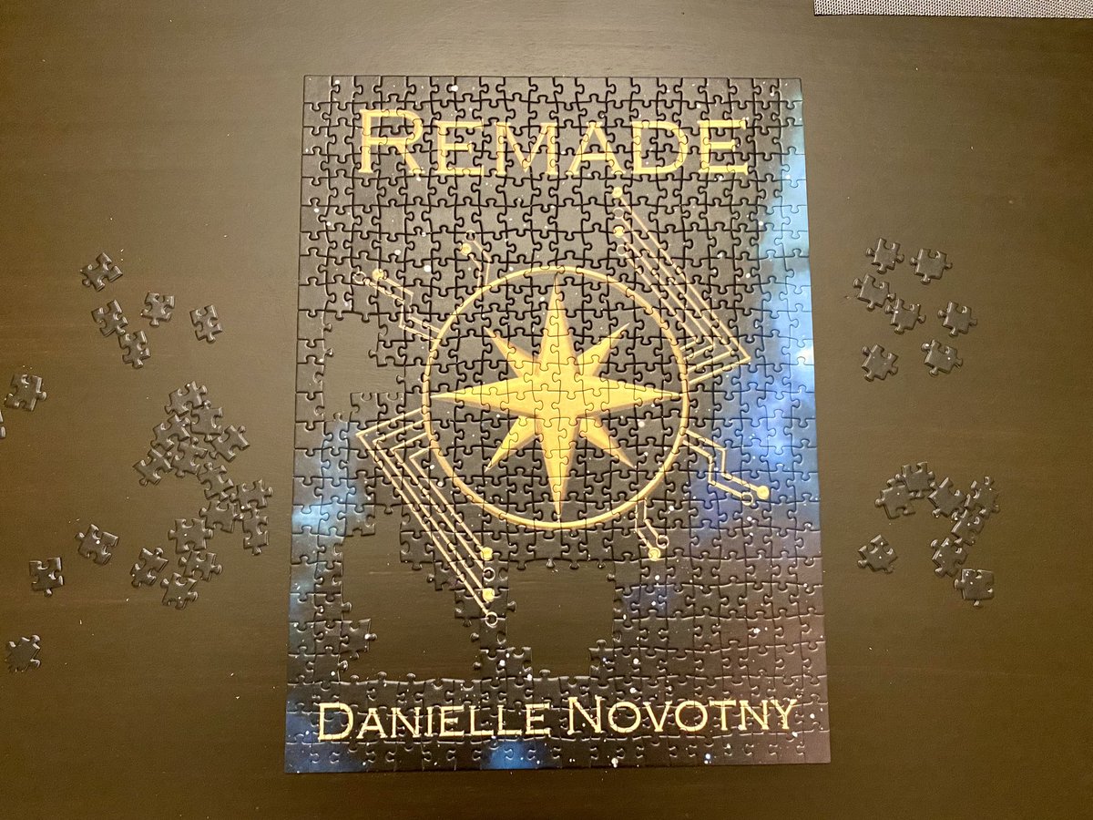 DanielleNovotny's tweet photo. Building a puzzle of your book cover is fascinating for so many reasons! I’ve never been more aware of the details and colors I put into REMADE’s cover. https://t.co/wMPaGrzYhg