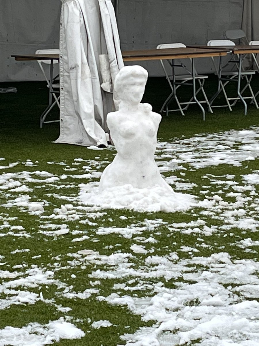 A second snowy day in a year! The Tucson Festival of Books tents served to block views but collected snow to allow snow sculptures galore. #desertliving