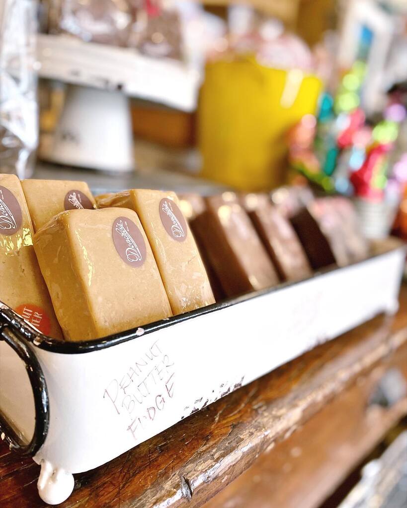 Peanut Butter, Milk Chocolate, &amp; Dark Chocolate Fudge, one of our most delicious traditions! Did you know the OG Fred Donckers used to whistle while spreading fudge into the pan? We still uphold his quirky recipe!