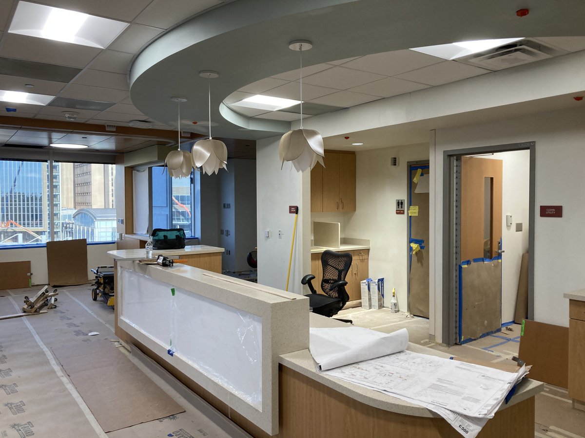 AYA Infusion update! On the left is the hallway leading to the space, which has a separate check in desk and waiting room for young adults. On the right is our new nurses station!
