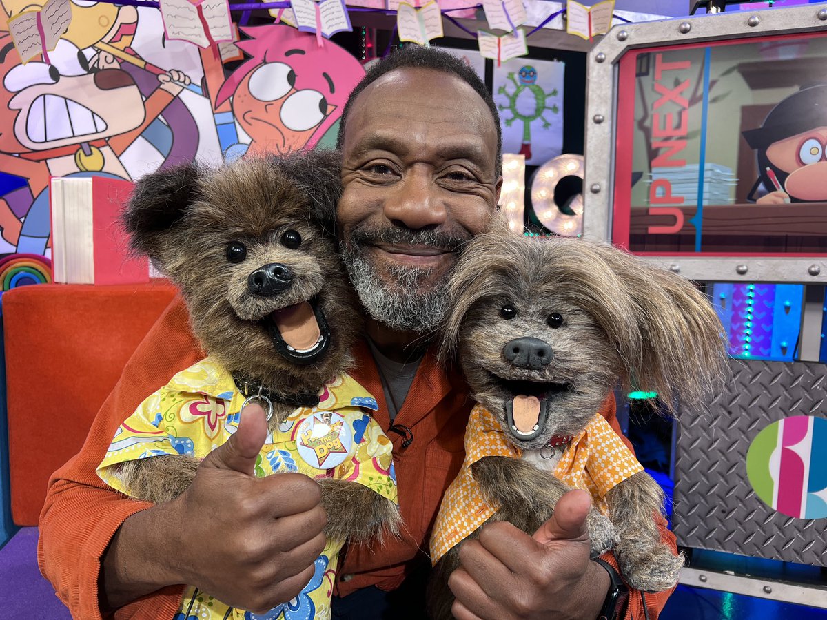 WarrickBP's tweet photo. Some days are amazing! Today was one of those days. So much fun and silliness with @LennyHenry, @Phil_Gluvets and @HackerTDog! 

#Puppeteer #DodgetheDog #HackertheDog #CBBC #WorldBookDay https://t.co/oNAQ786GVe