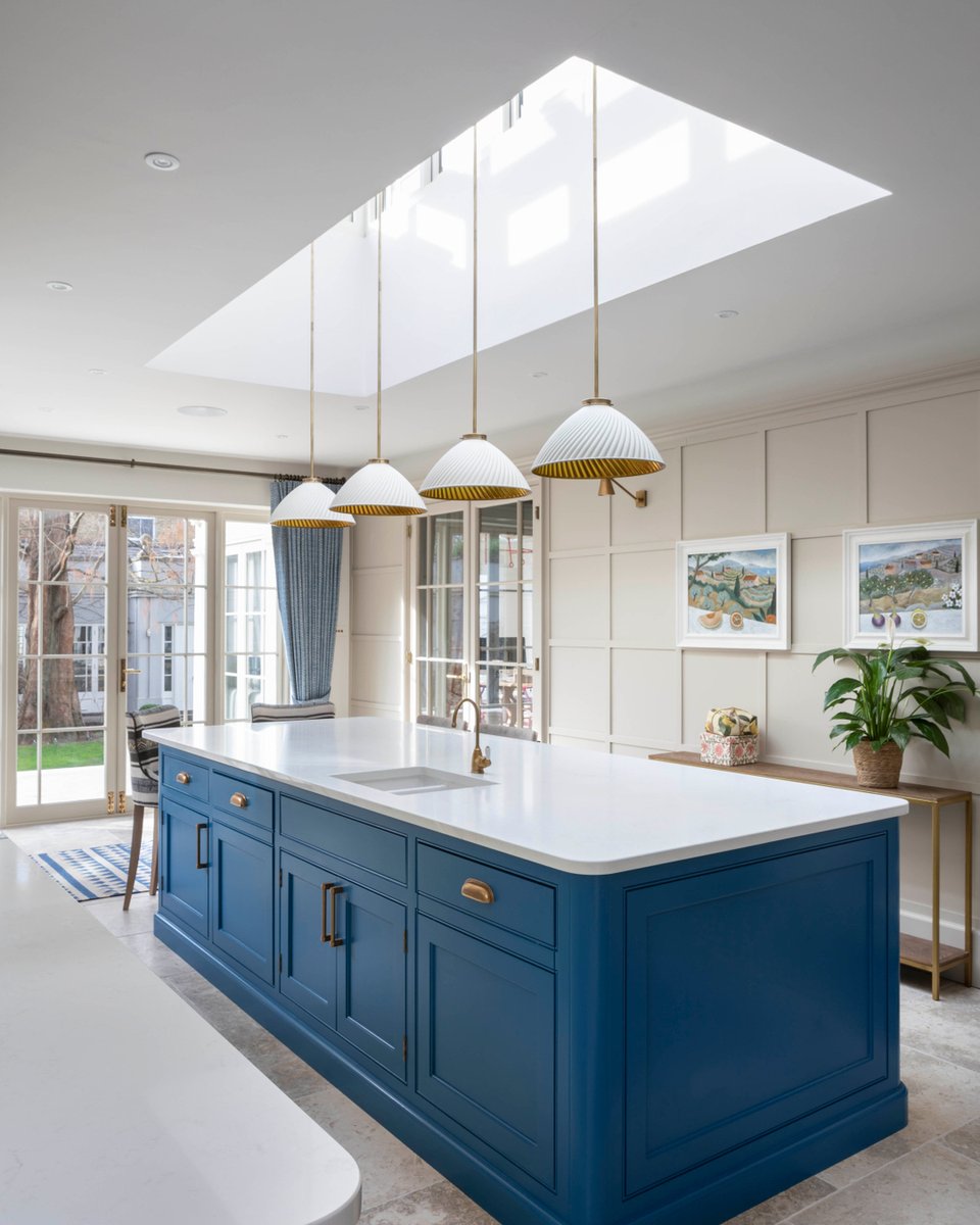 The beautifully crafted full-panelled wall by @barrkitchens painted in Paint &amp; Paper Library’s Stone IV creates a calming backdrop to the striking kitchen island.

Sailing boat blue by @williamyeoward​​​​​​​​ adds a cool pop of colour to this bespoken country ki