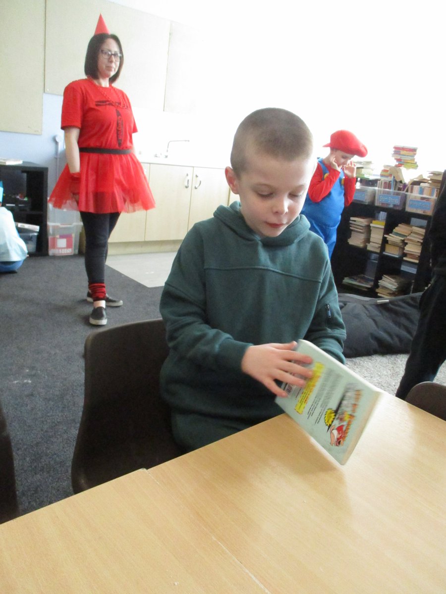2W_MrsWalsh's tweet photo. What a great day to visit our new school library! What an amazing space we now have to enjoy reading with our frineds! #makeadifference #EnglishOLOL https://t.co/64fS5dLlex