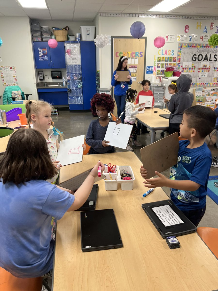 MrsSGalloway's tweet photo. Kindergarteners compared shapes and created shapes based on the attributes listed by Mrs. Smiley. A student explained, “A triangle has three vertices and three sides.” #NumberedHeadsTogether #CooperativeLearning @Jennings_Creek https://t.co/66L0g0csmc