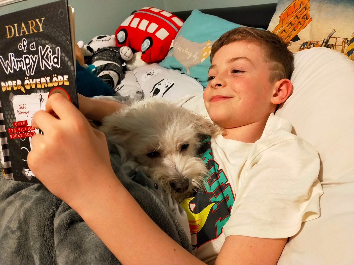 Dylan got caught reading with his dog Minnie! @PatPriAcad #getcaughtreading