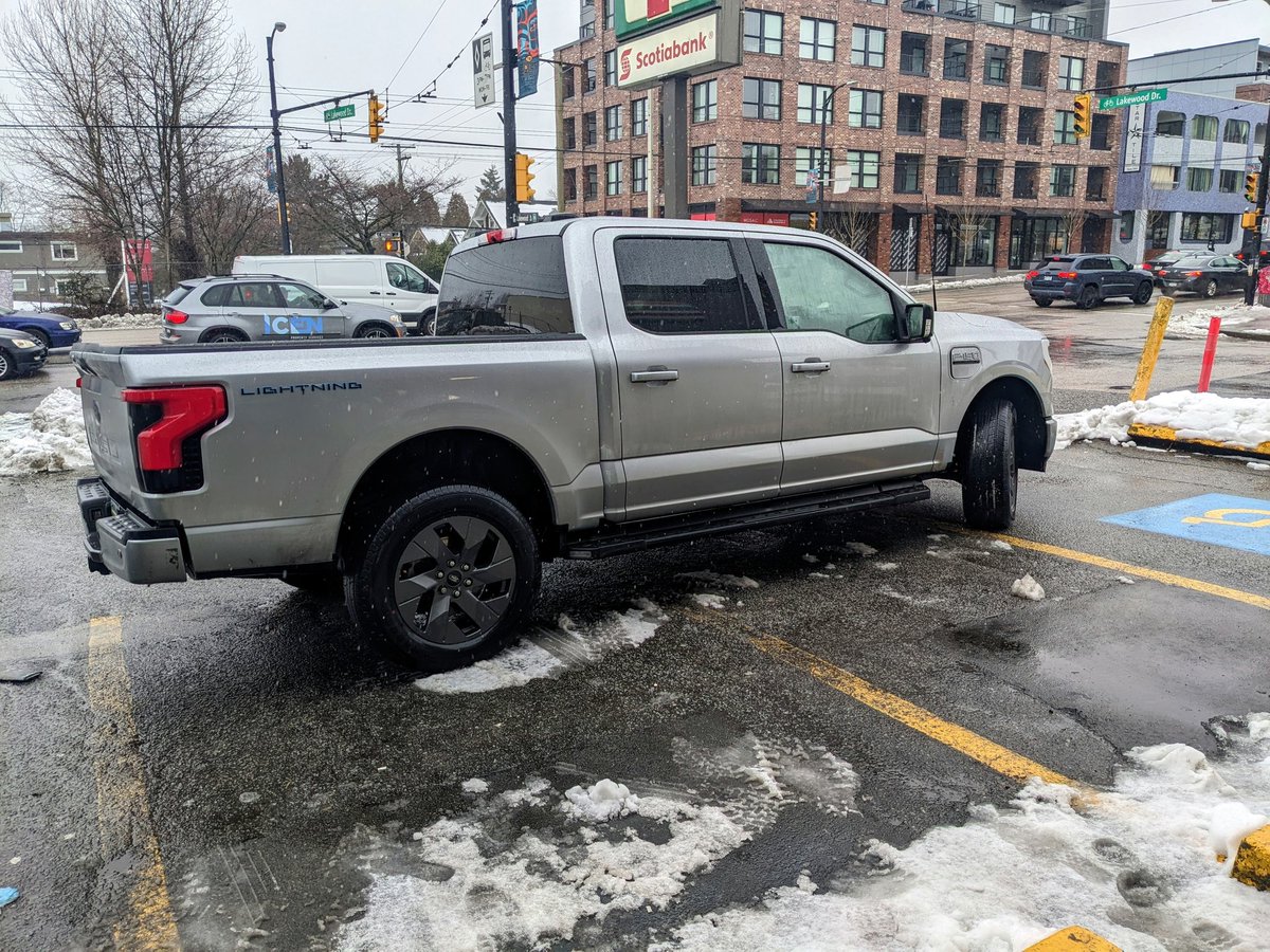 Recalling @CBCStephenQuinn's thread of bad East Van pickup truck parking jobs from last November, I raise you this entry: Four spots including the accesible spot rendered unusable, for half an hour as these guys ate their <a href="/7ElevenCanada/">@7ElevenCanada</a> nachos. <a href="/badparking/">Bad Parking</a>