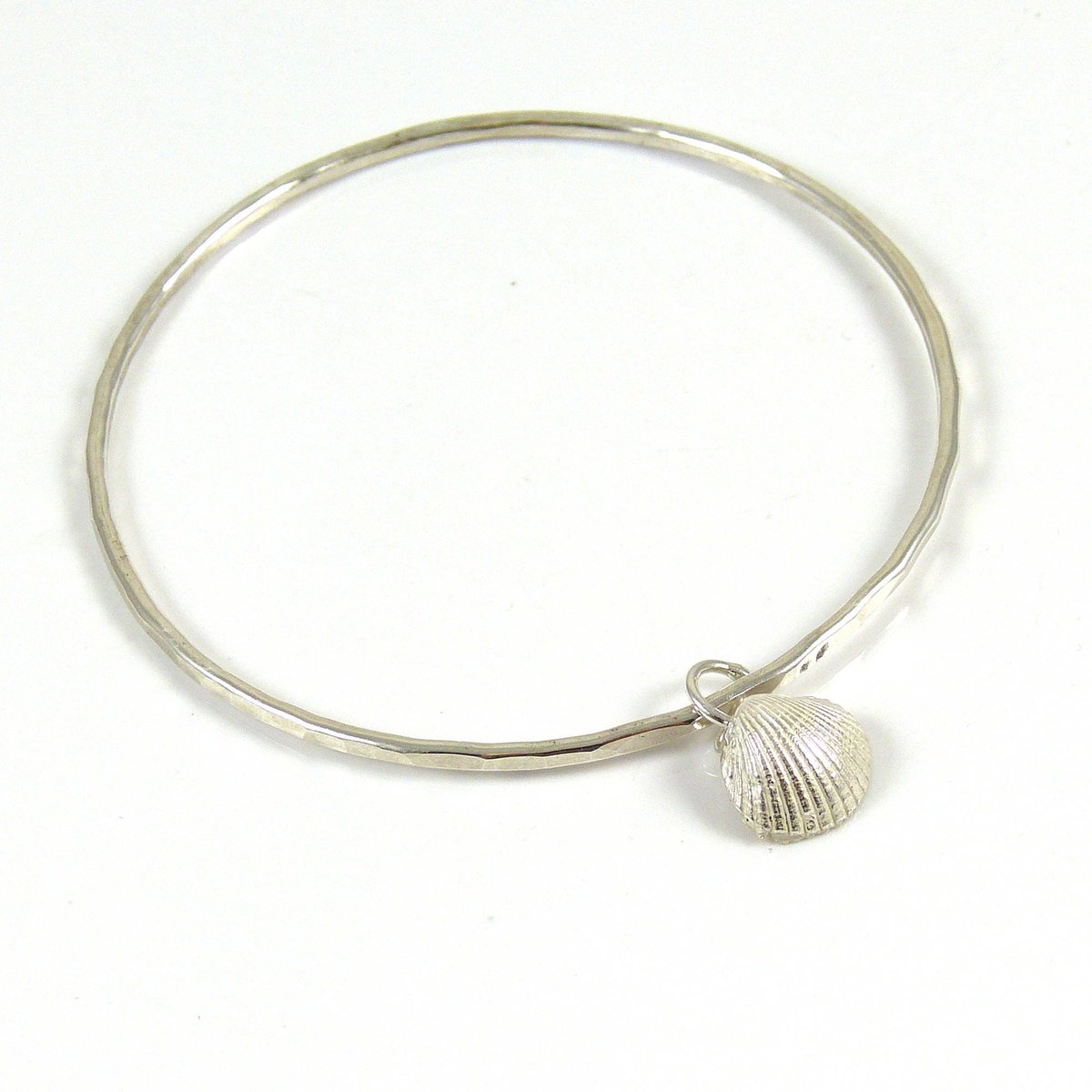 TheStrandline's tweet photo. Silver Bangle, Seashell Bangle, Handmade Bracelet, Cockle Shell Charm, Beach Bracelet, Hammered Bangle, Gift Idea, Silver Sea Shell https://t.co/x8WO7OdJvs #EarlyBiz #UKGiftHour #UKGiftAM #northumberland #warkworth #thestrandline #HammeredBangle https://t.co/yUOqrDj25N