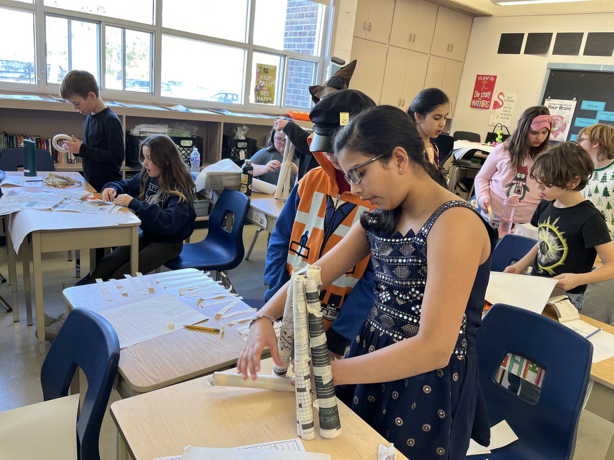 AvonHahn's tweet photo. Stem challenge: to create a structure to withstand the weight of a basketball being pulled down by gravity using paper. Students had to find ways to make the paper stronger e.g. folding/ rolling and make changes if their tower crumpled or the ball fell off. https://t.co/4CZKXRvTTF