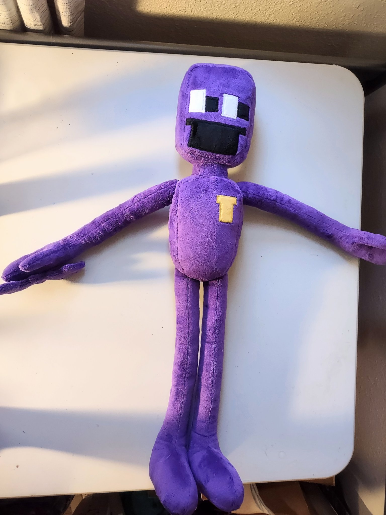 Purple best sale guy plush