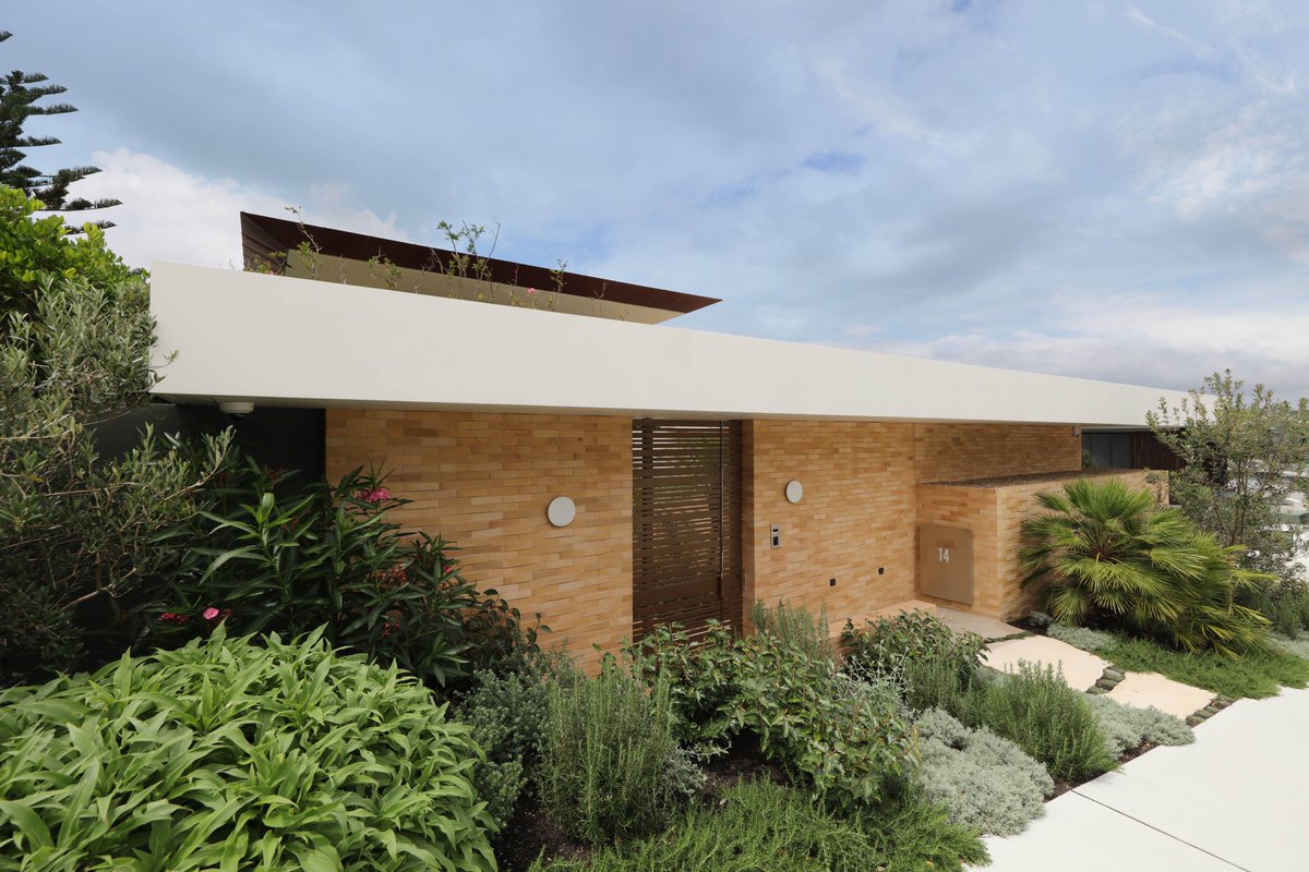 New Nomination: New House by Dods and Zuccon Architects

"A demure addition to the streetscape, this contemporary new house is set low behind a ‘woven’ brick wall and luxurious landscaping."

Check out this nomination and many more at mosmandesignawards.com.au
