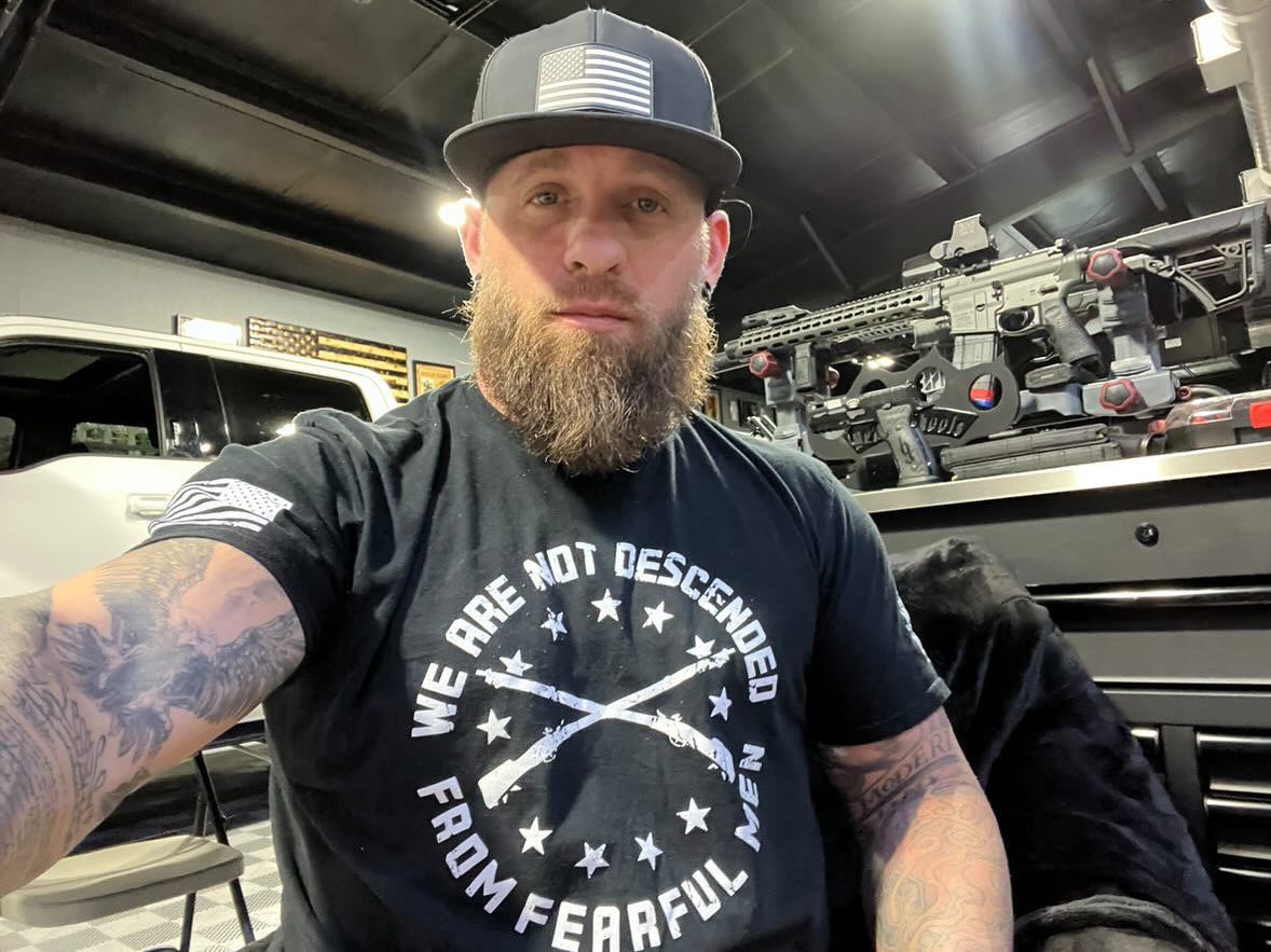 .@brantleygilbert repping our 'We are not descended from fearful men' tee. Check out that badass collection behind him. #2a #bgnation #DefendThe2nd