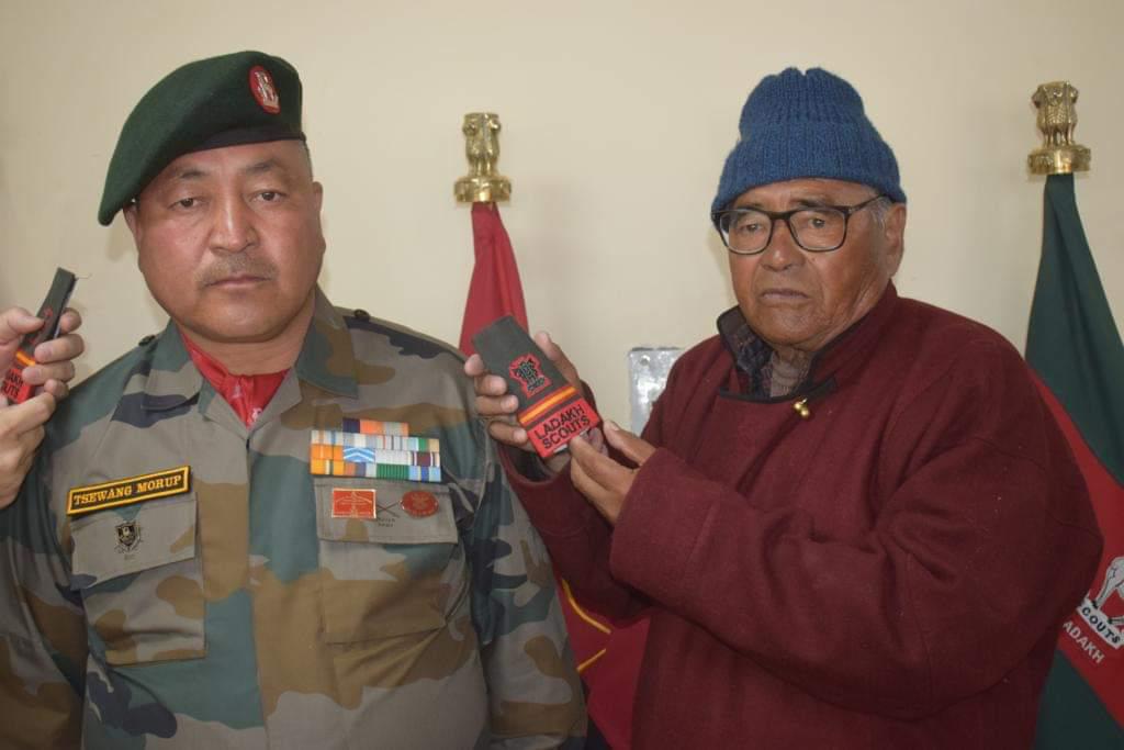 #IndianArmy
So much of #gallantry in one pic. Nb Sub #ChheringMutup, #AshokChakra (won it in Siachen) pipping his son,  SubMaj #TsewangMorup, #VirChakra (Kargil Conflict) to the rank of Sub Maj  at Ladakh Scouts Centre, near Leh. Note the steadfastness and a chilled out demeanor!