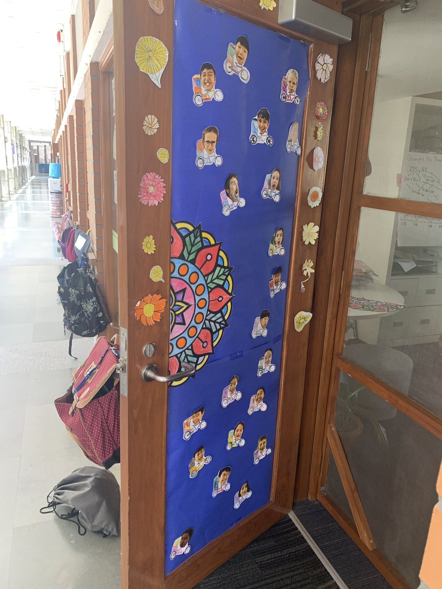 AISCElementary's tweet photo. Student created #Litweek door decorations to support our visiting author Mitali Perkins! #AISCElementary https://t.co/VaBG10SbAU