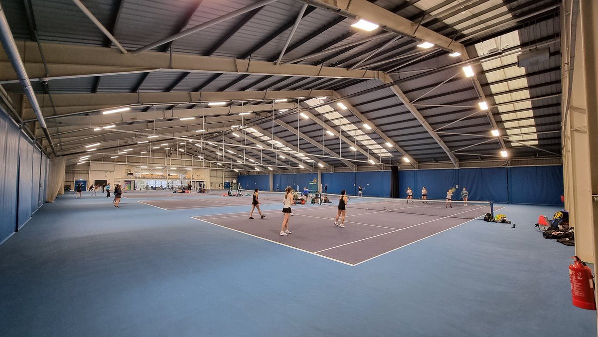 CoachCobie's tweet photo. 4 very busy courts for practice at Cardiff Met Tennis Centre this morning 🏴󠁧󠁢󠁷󠁬󠁳󠁿🎾
Let's go @LtaBerkshire Girls 18U Team 👊
#TeamBerkshire #CountyCup @LTACompetitions https://t.co/syTZn0uvl6